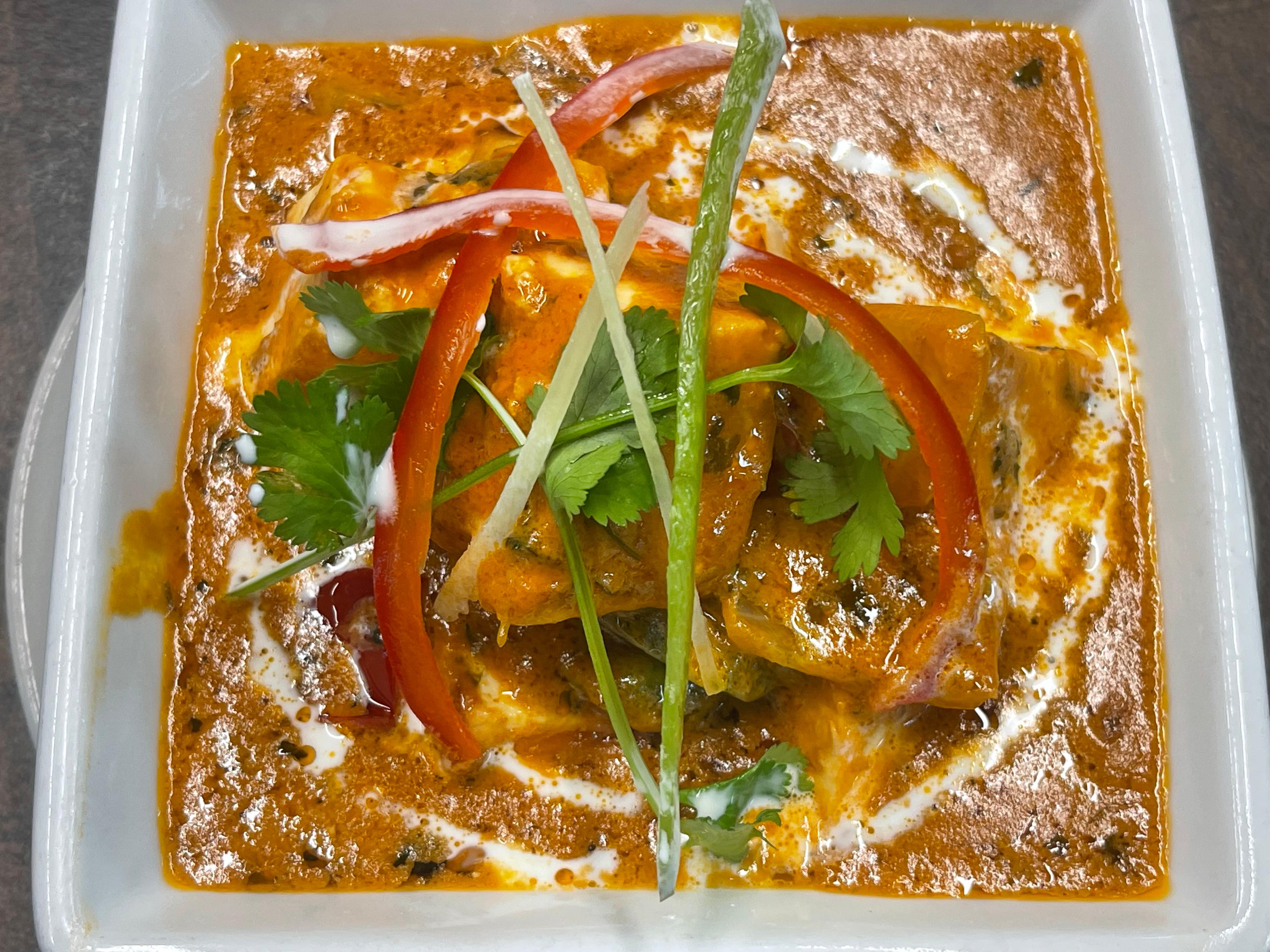 Paneer tikka masala in rich creamy curry