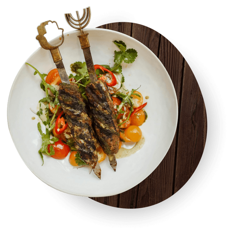 Steamed momo dumplings served with traditional dipping sauce